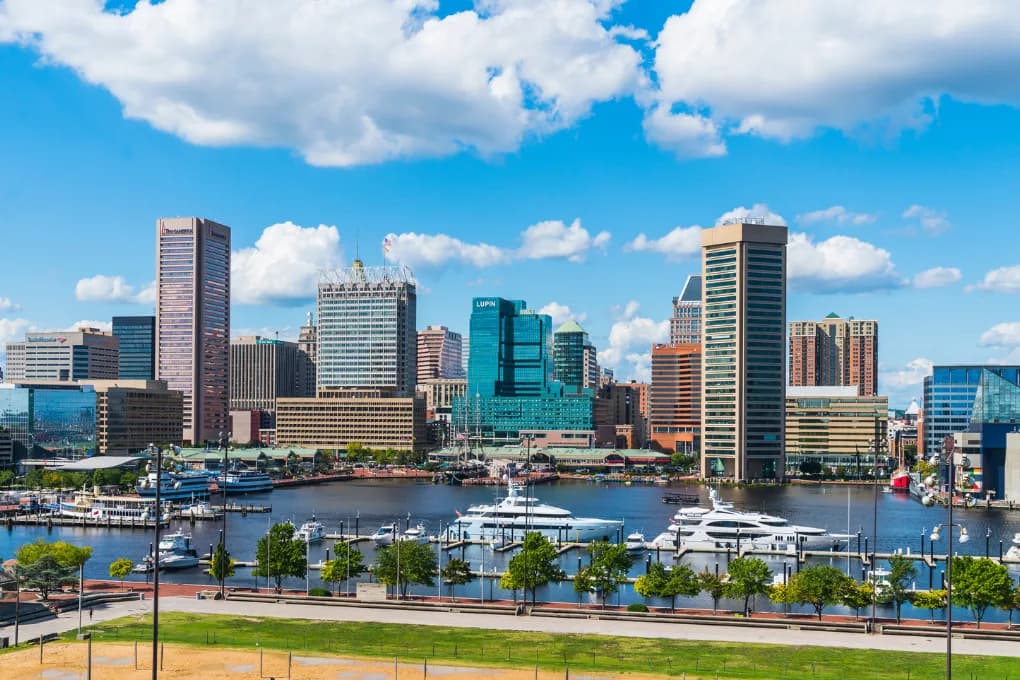 Baltimore city, featuring the inner harbor and water-front buildings.